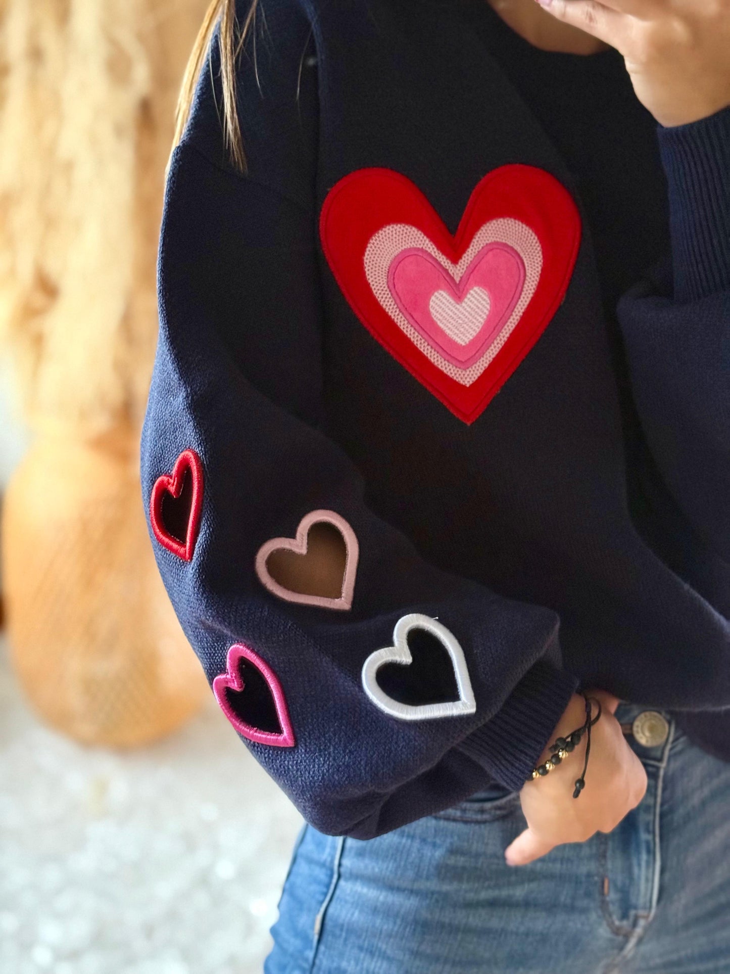 Suéter corazón troquelado