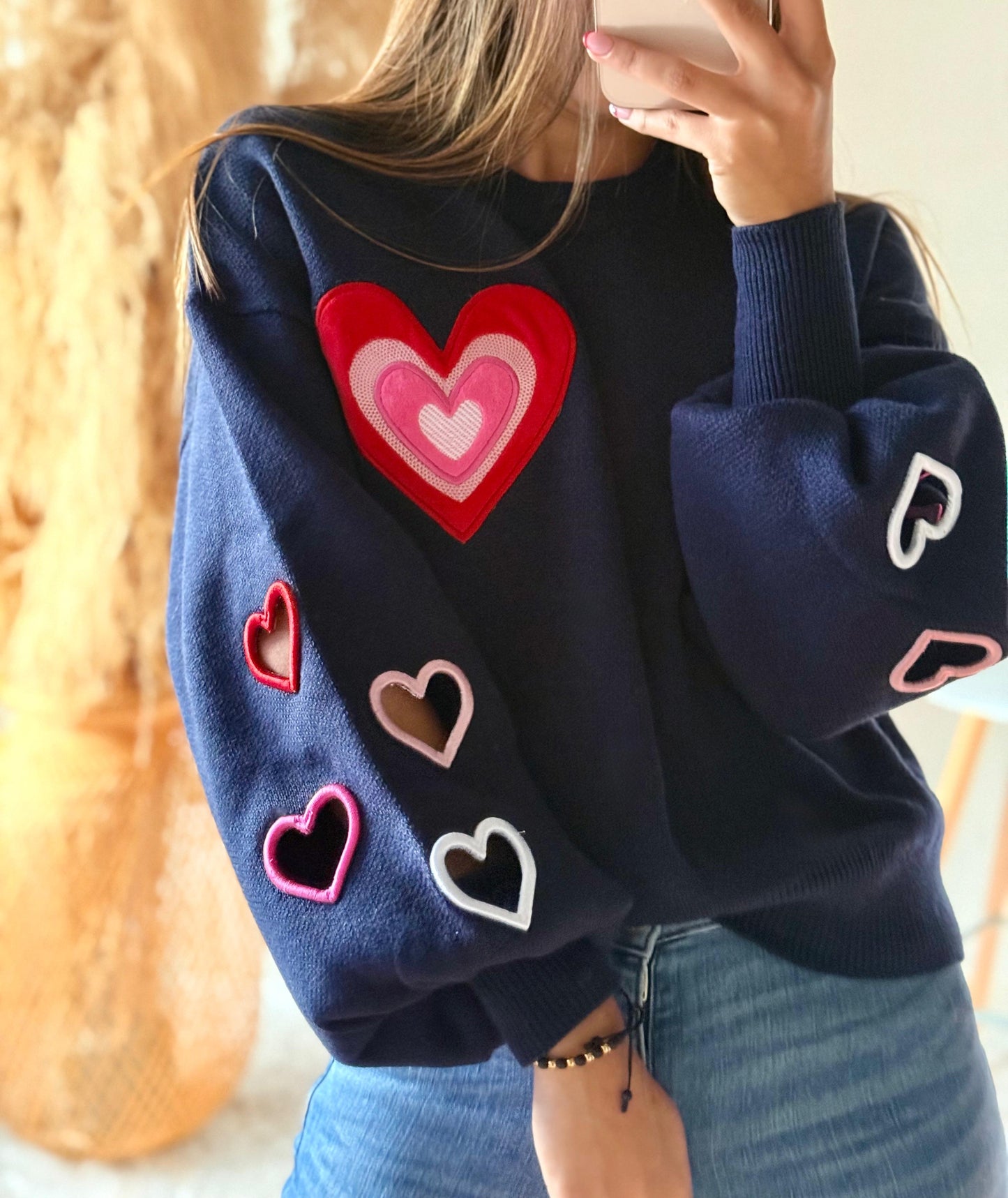 Suéter corazón troquelado