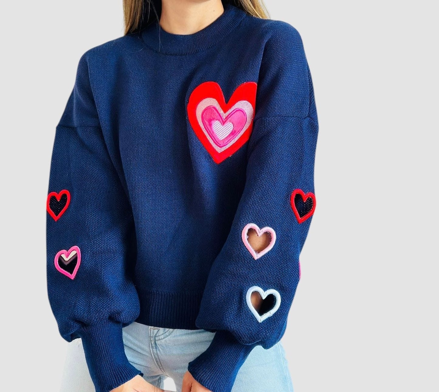 Suéter corazón troquelado